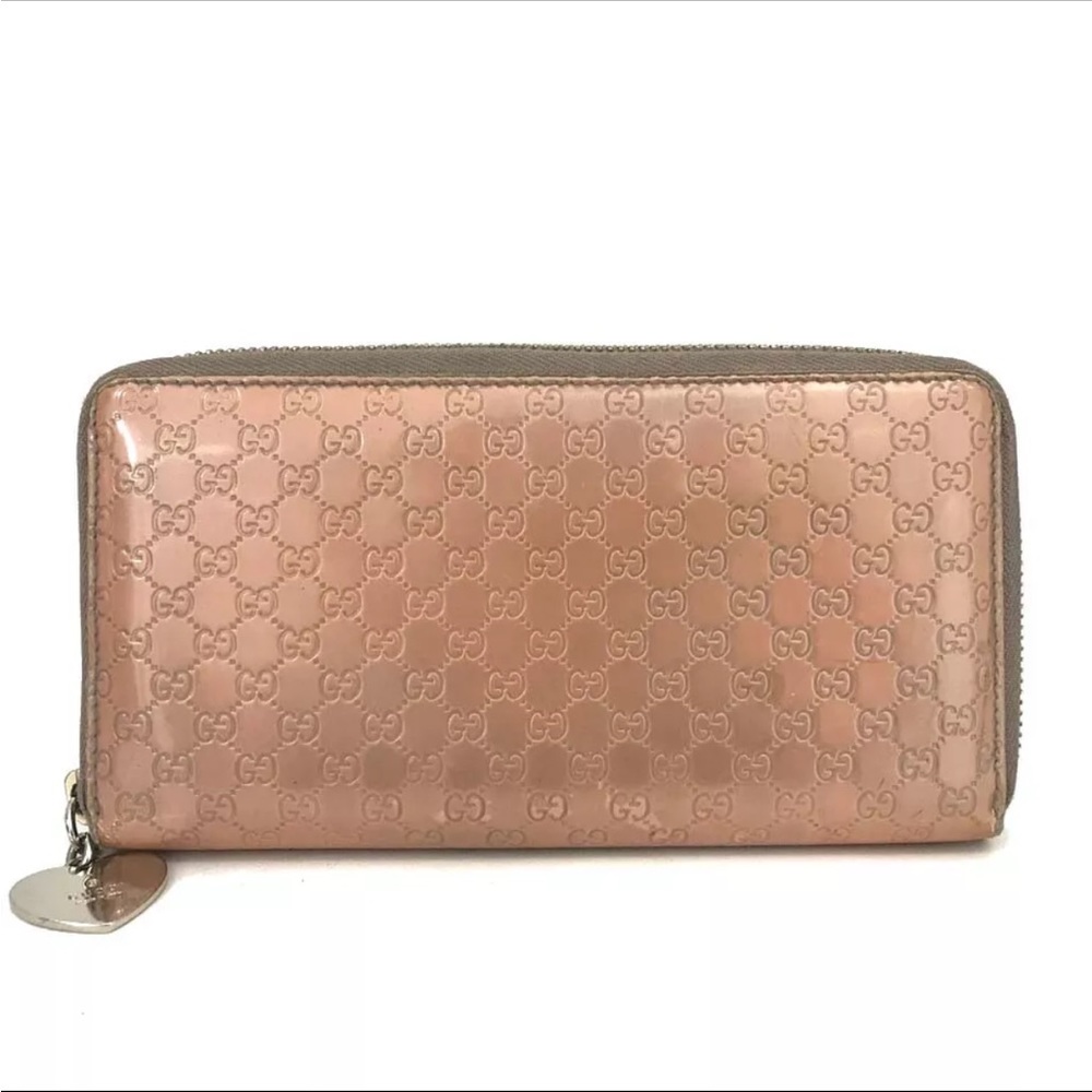 Vintage Gucci Pink Leather Wallet with Embossed Pattern Heart Charm